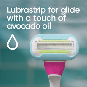 Person holding Gillette Venus disposable razor showing ergonomic grip