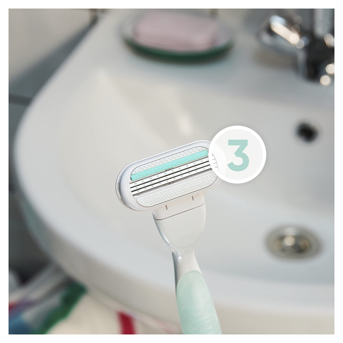 Gillette Venus cartridge next to a ruler demonstrating compact size and control