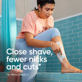 Close-up of a single Gillette Venus razor head showing three blades for a smooth shave