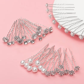Gingbiss scale comparison in hand illustrating pin length and easy handling for stylists