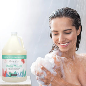 Ginger Lily Farms bottle placed in a spa shower illustrating professional use