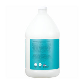 Ginger Lily Farms conditioner texture pouring to show creamy non-greasy consistency