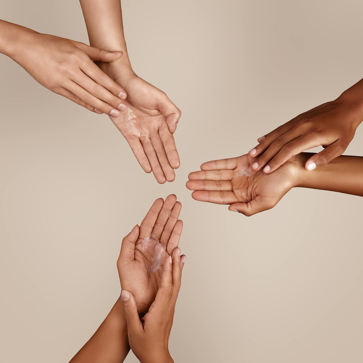 Ginger Lily Farms being dispensed into hands showing effective cleansing