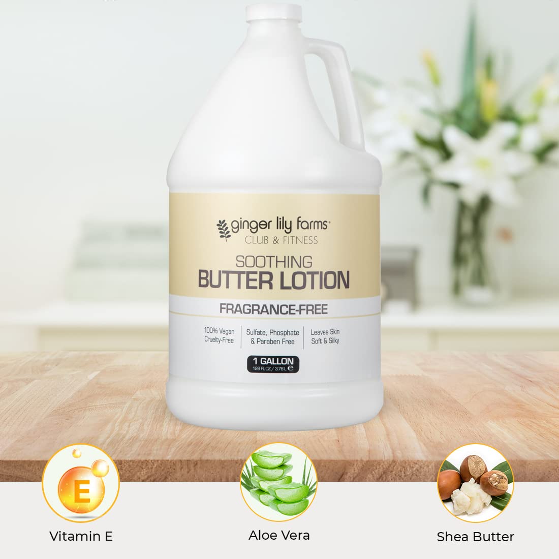 Ginger Lily Farms gallon beside a hand demonstrating scale and generous 128 fl oz refill size