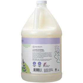 Ginger Lily Farms shampoo being poured to show smooth texture and lather