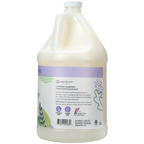 Ginger Lily Farms hand pouring refill into dispenser for easy restocking