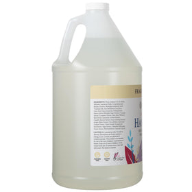 Ginger Lily Farms pouring refill into a foaming dispenser for easy refill benefit