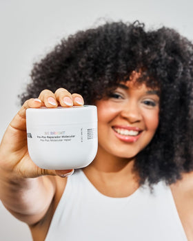 Ginger Milk packaging close-up showing vegan sulfate-free sustainability callout