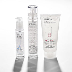 GIOVANNI bottle next to hand demonstrating 2.75 oz size and travel convenience benefit