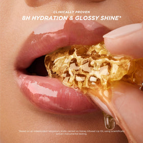 Gisou Fresh Honey on lips delivering hydrated, luminous look and comfort