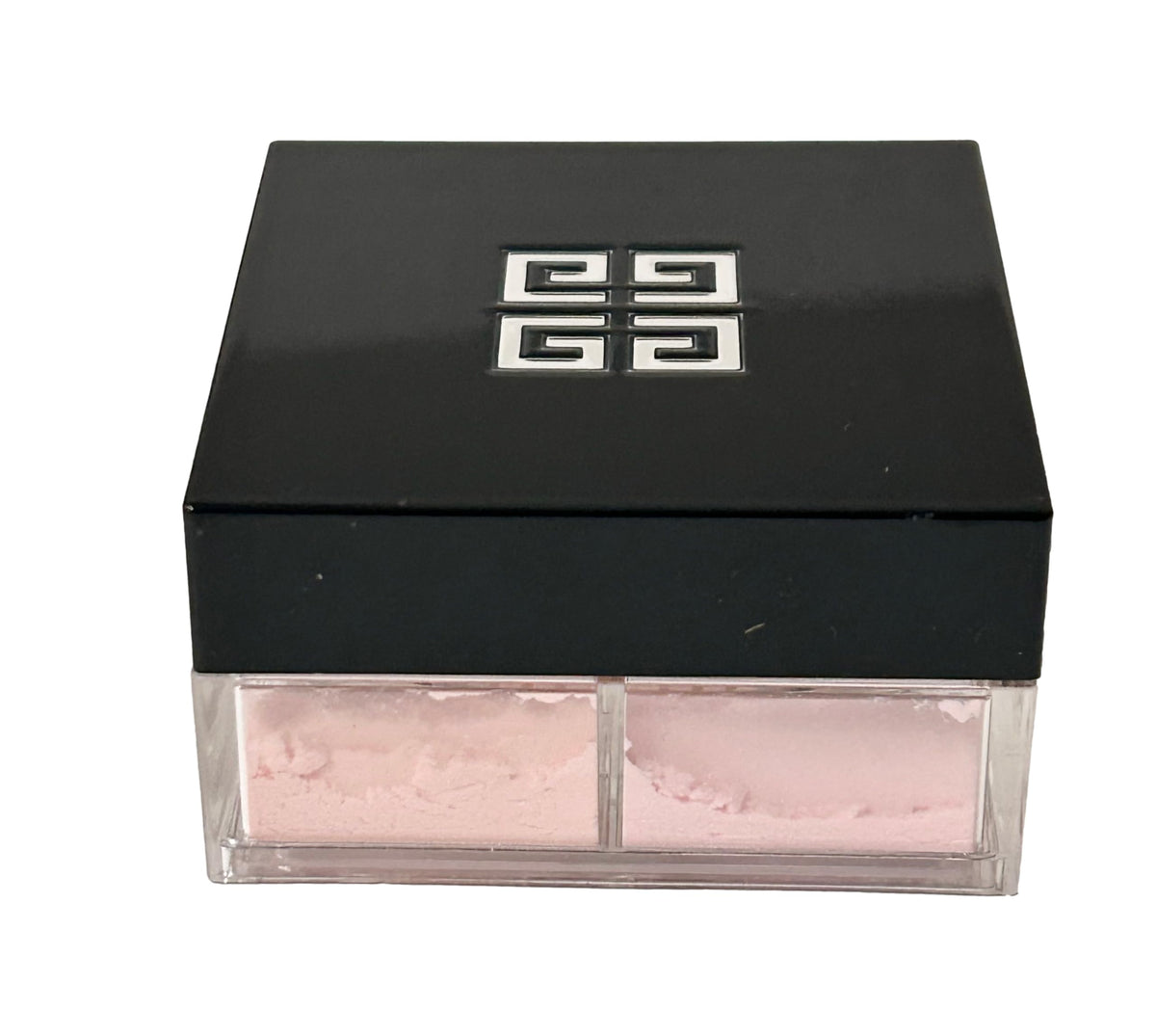 Givenchy Prisme Libre on vanity with makeup tools suggesting versatile everyday benefit