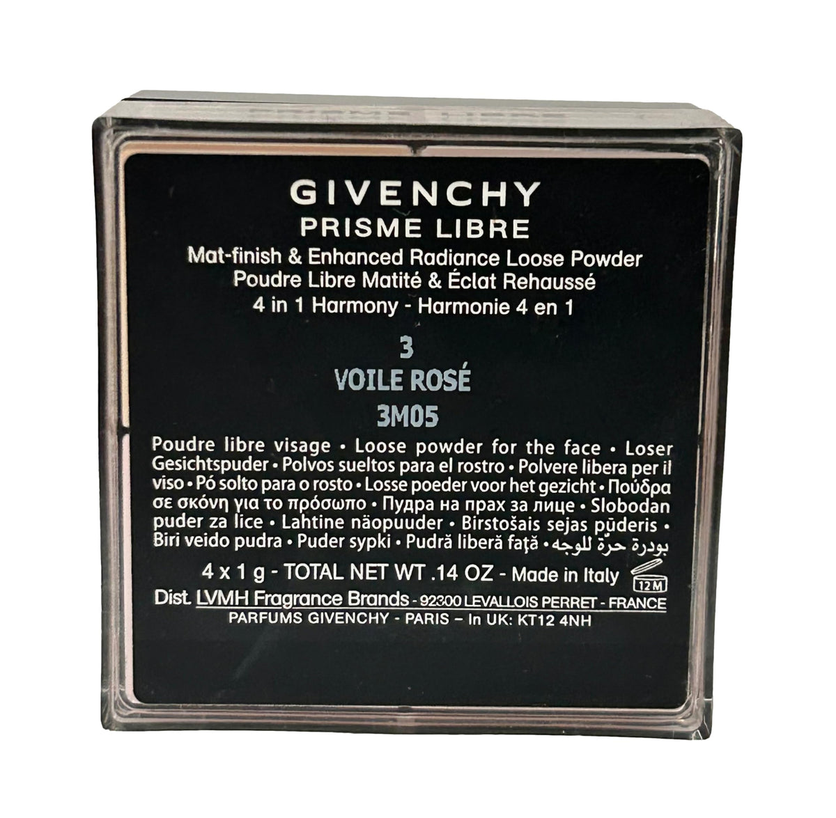 Givenchy Prisme Libre next to coin for size comparison illustrating travel-friendly benefit