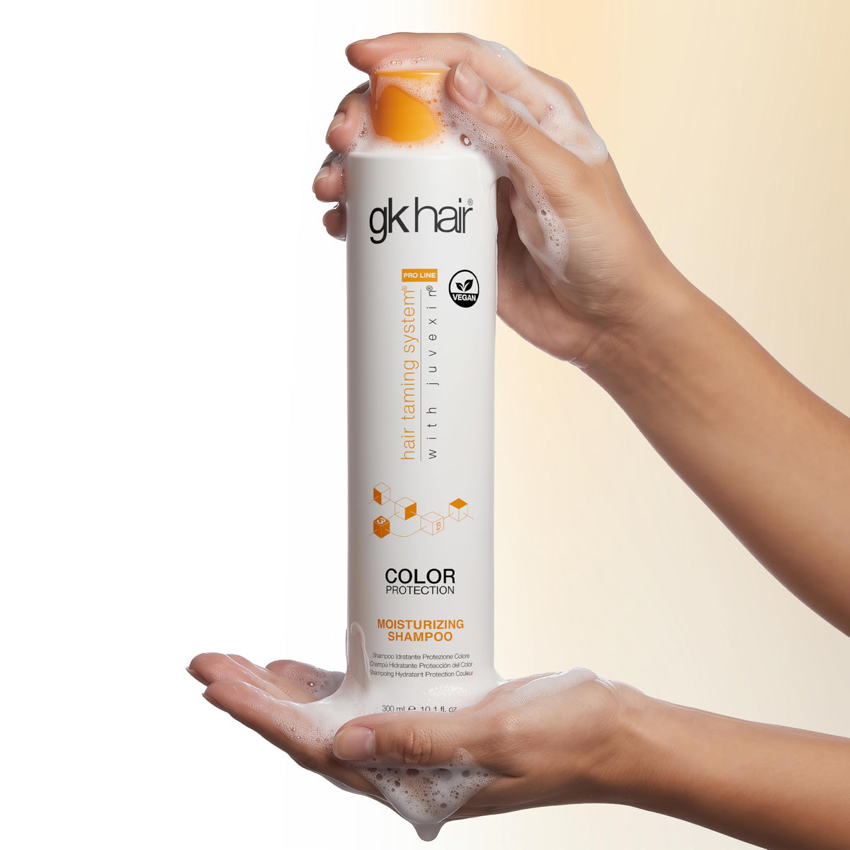 GK HAIR bottle on bathroom shelf lifestyle scene conveying everyday use
