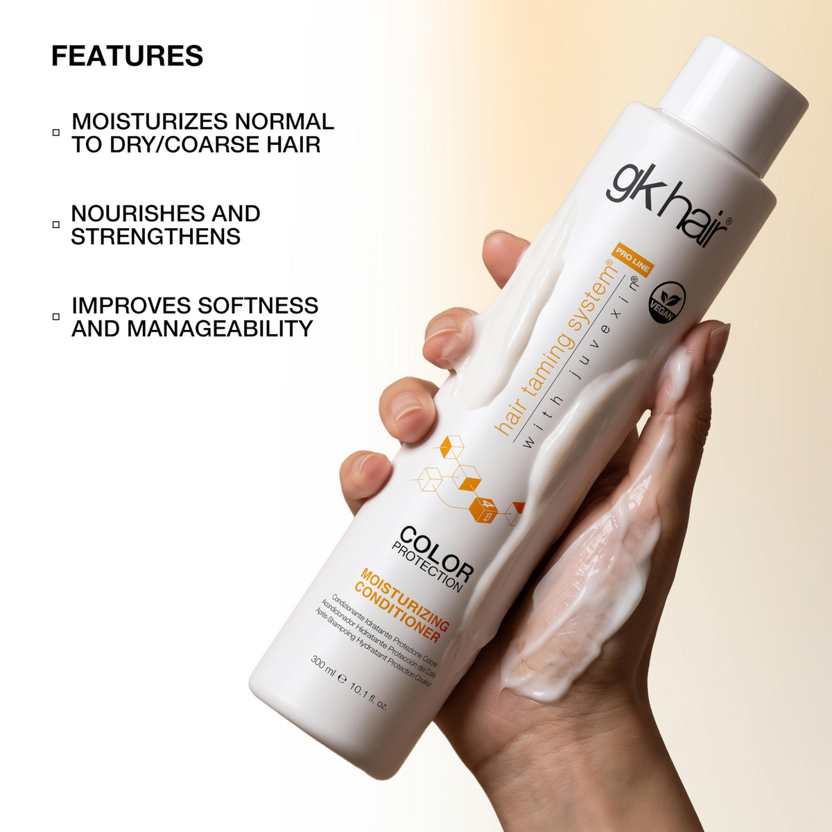 GK HAIR creamy texture on hand showing rich moisturizing formula