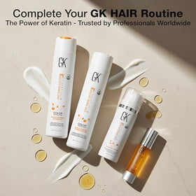 GK HAIR bottle in hand to show 1.69 oz scale and portable convenience