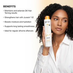 GK HAIR shampoo pouring onto hair illustrating ease of application