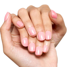GLAMERMAID lifestyle shot, woman typing with polished nails for professional finish