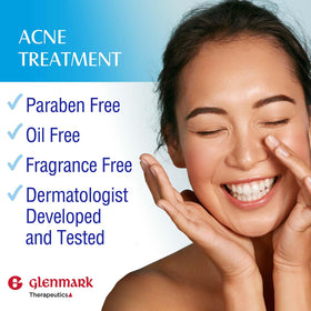 Applying Glenmark adapalene gel on fingertip ready for face to help reduce clogged pores