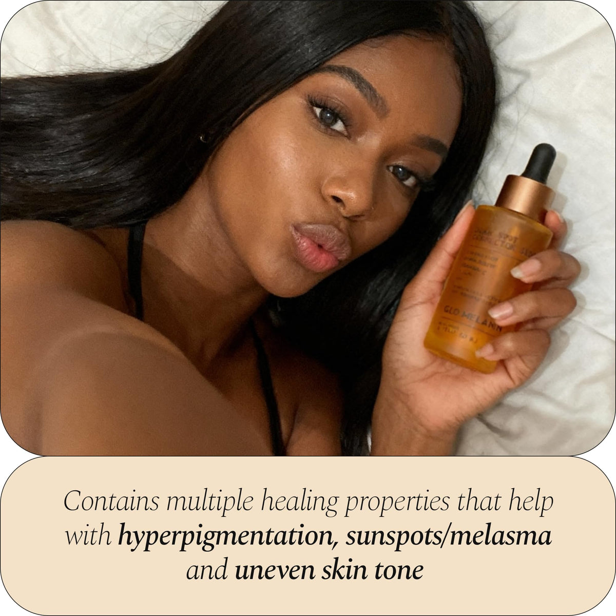 Glo Melanin bottle styled with flowers suggesting gentle nourishing formula