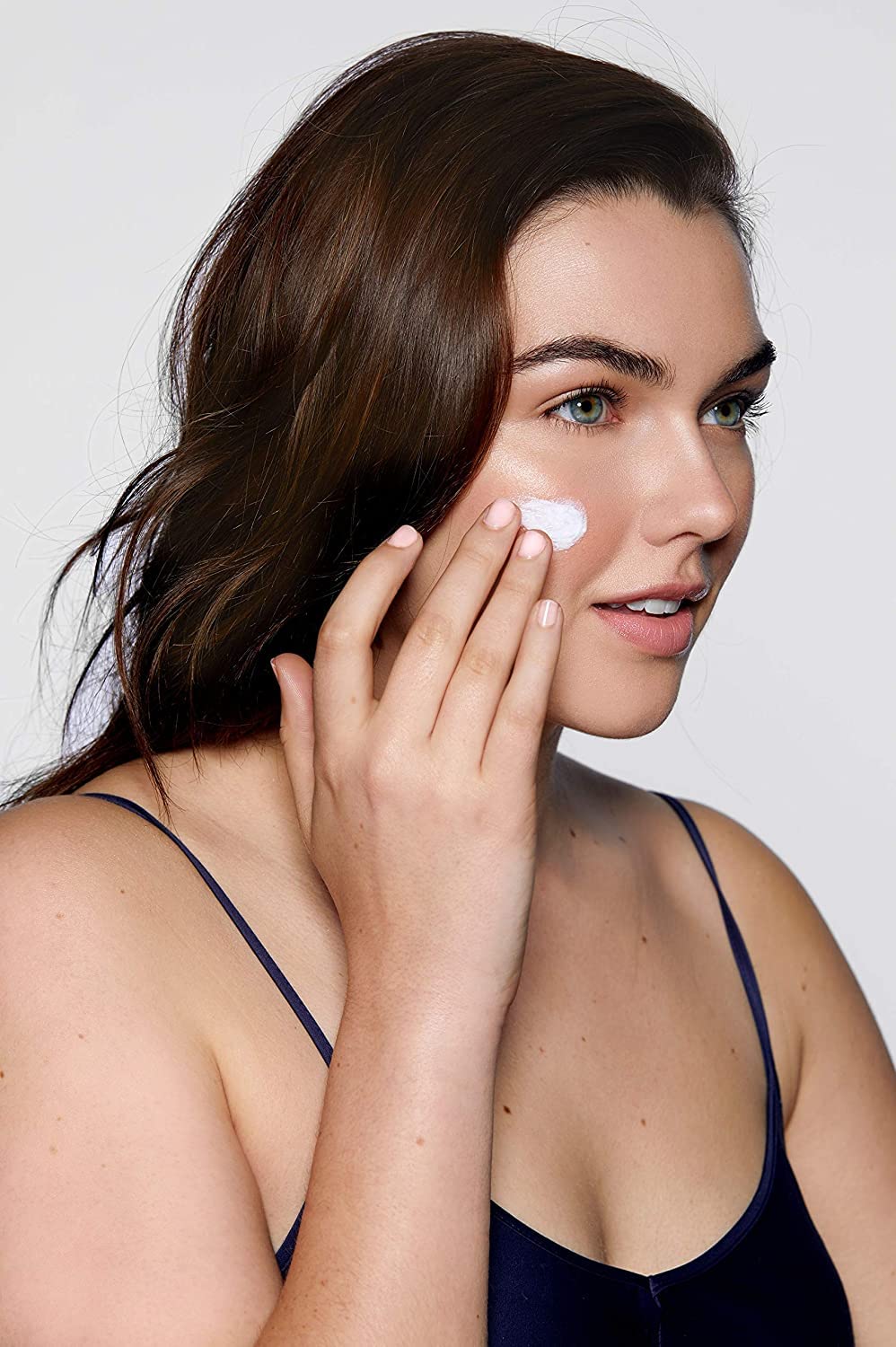 Glo Skin Beauty size comparison with common object, clarifies 1.7 oz scale benefit