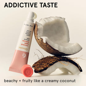 Glossier Balm Dotcom being applied to lips for immediate smoothing and long-lasting comfort