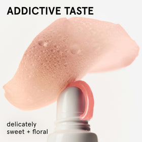 Glossier balm sheen on lips illustrating natural pink tint and hydration