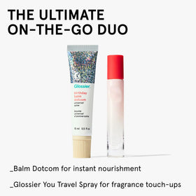 Glossier Balm Dotcom on a bathroom counter in a lifestyle setting for everyday use