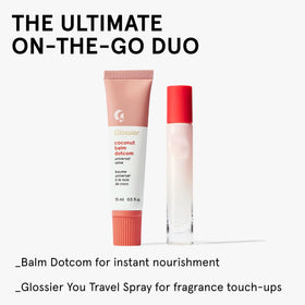 Glossier Balm Dotcom on a bedside table ready for overnight use to restore dry patches