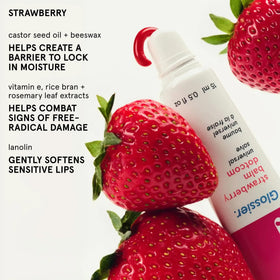 Glossier Balm Dotcom applied to lips close-up, Glossier tint adds natural berry color and comfort