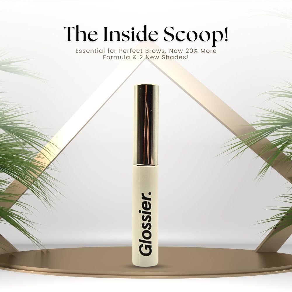 Glossier Boy Brow beside everyday items for size comparison and portability