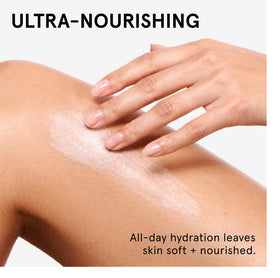 Glossier applying body butter to arm demonstrating quick dry-touch benefit