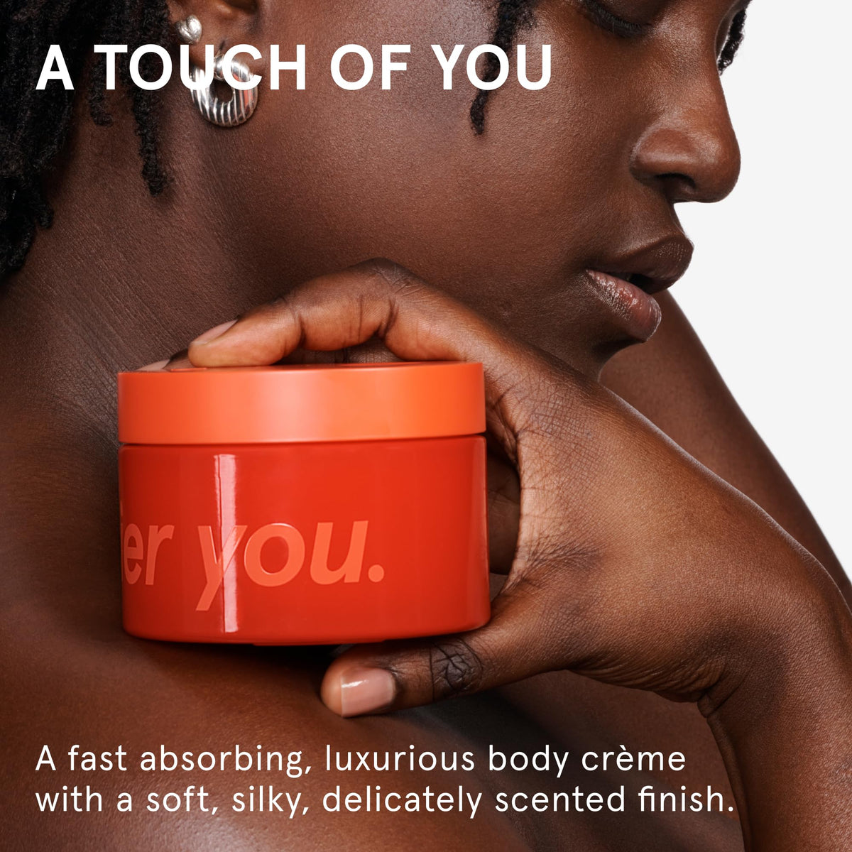 Glossier cream texture close-up showing smooth, fast-absorbing finish