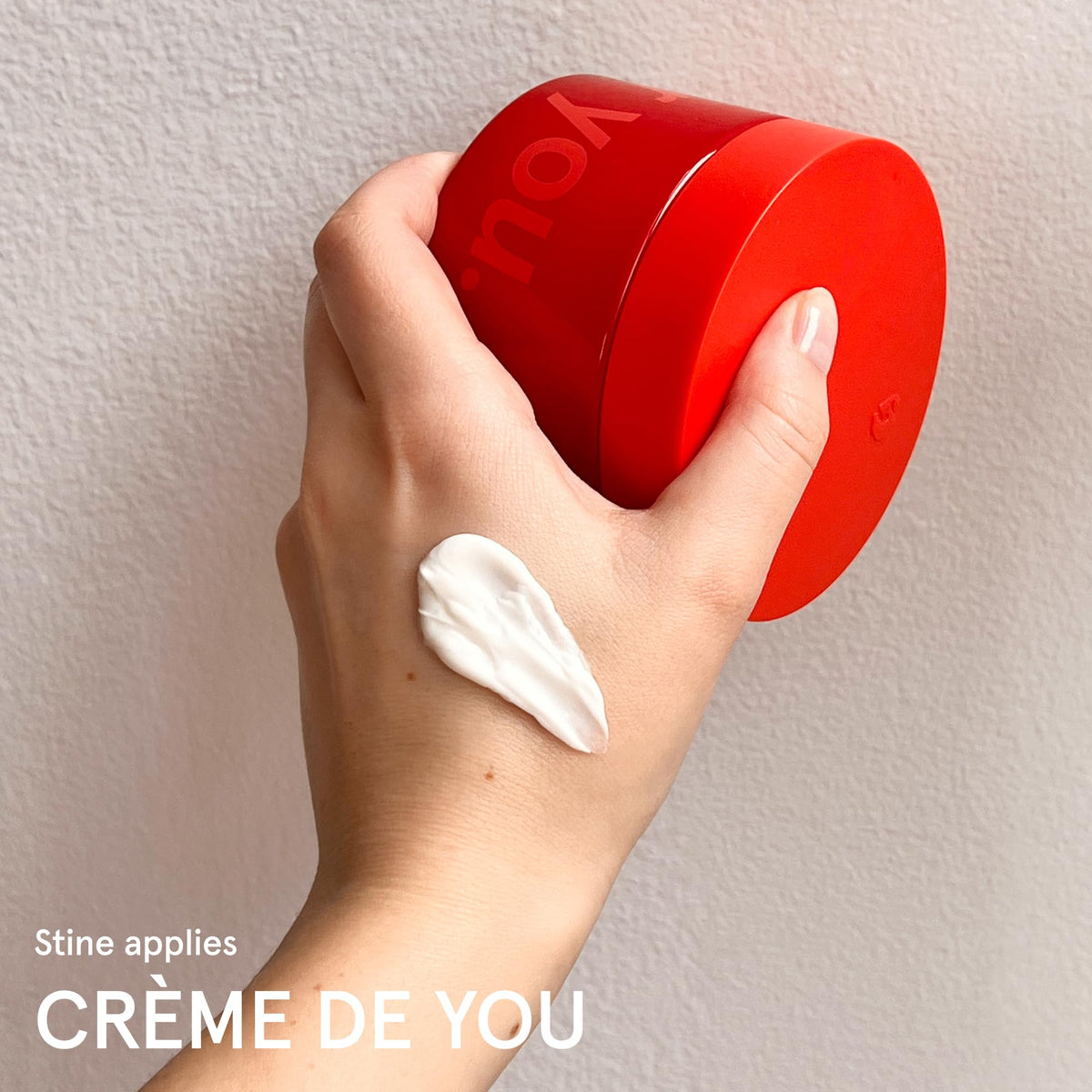 Glossier scent notes graphic representing warm spicy layering benefit