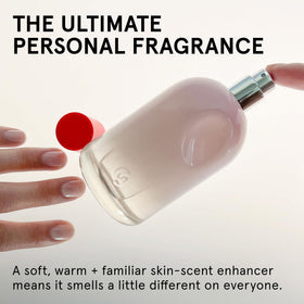 Glossier thumbprint detail on bottle highlighting tactile design and personal touch
