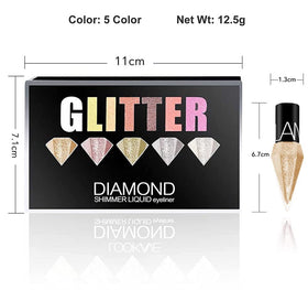 Go Ho eyeliner pens next to a coin to show compact travel-friendly size