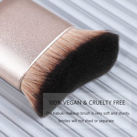 GOERTI brush applying self-tanner on leg for even natural color