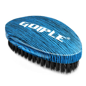 Goiple front view of blue curved wave brush showing sleek beech handle and bristles for precise styling