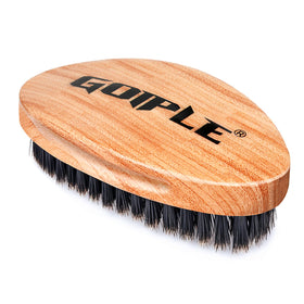 Goiple front view of coffee-colored palm brush showing sleek shape and control