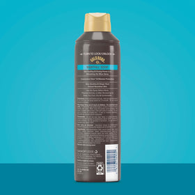 Gold Bond Recharge spray nozzle closeup displaying no-mess application benefit