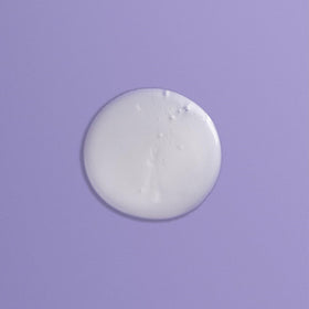 Goldwell Just Smooth bottle in shower scene demonstrating daily use and easy rinsing