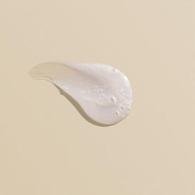 Goldwell Rich Repair in bathroom scene showing professional-at-home benefit