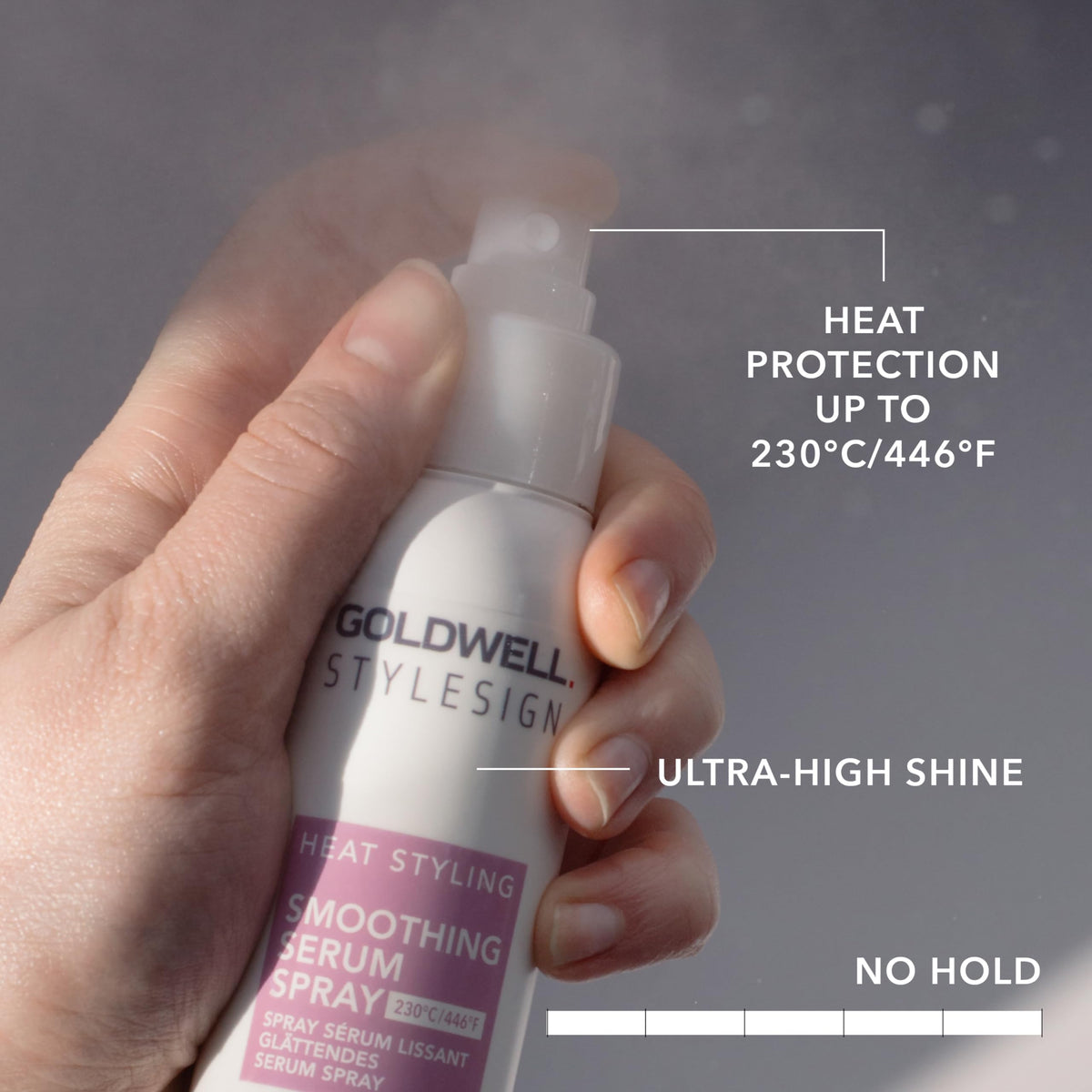 Goldwell spray action over dry hair for even coverage and easy styling