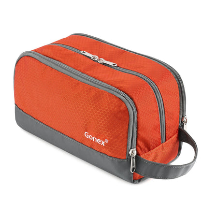 Gonex front view orange toiletry bag showing organized pockets and bright color