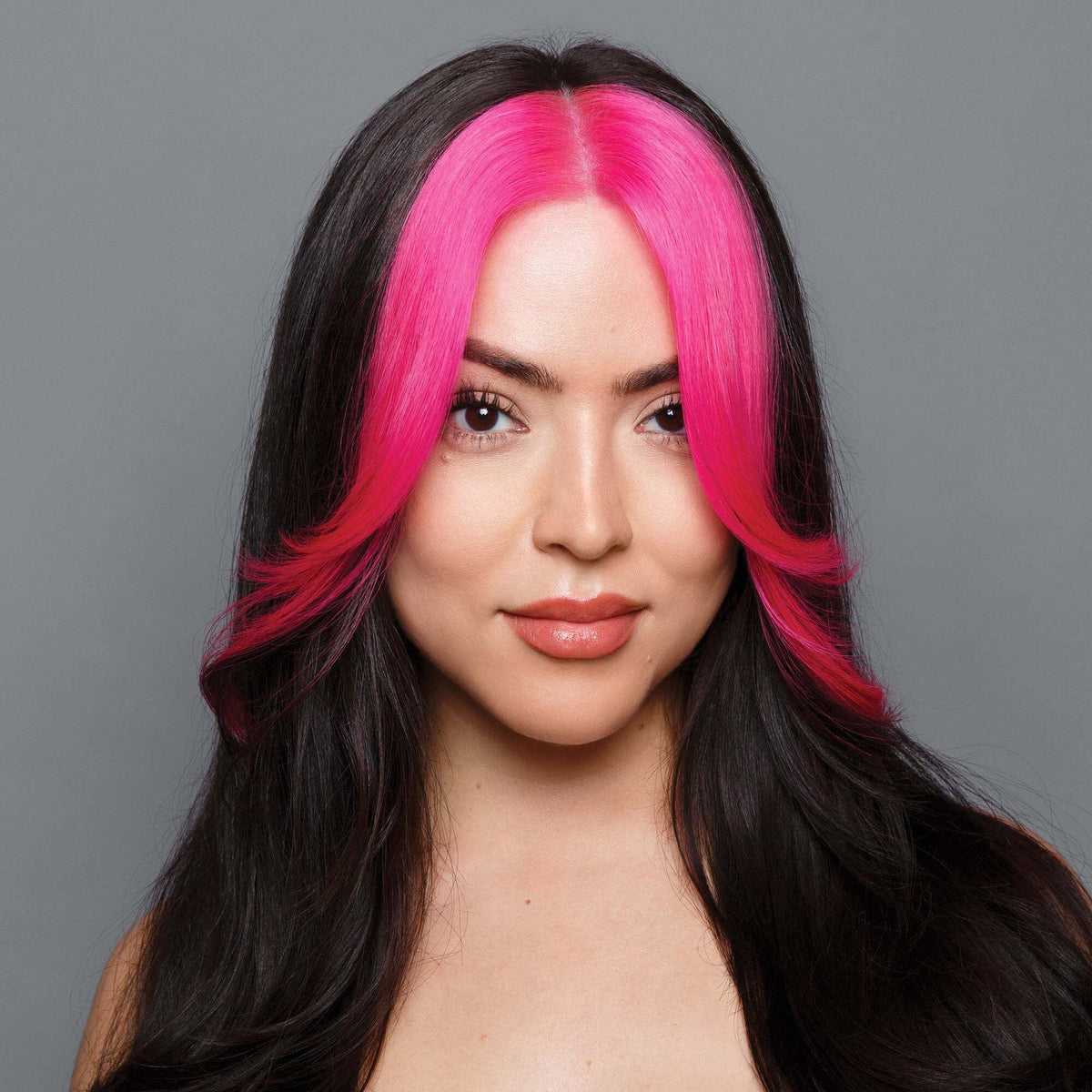 Good Dye Young tube close-up revealing cream texture and easy-squeeze application