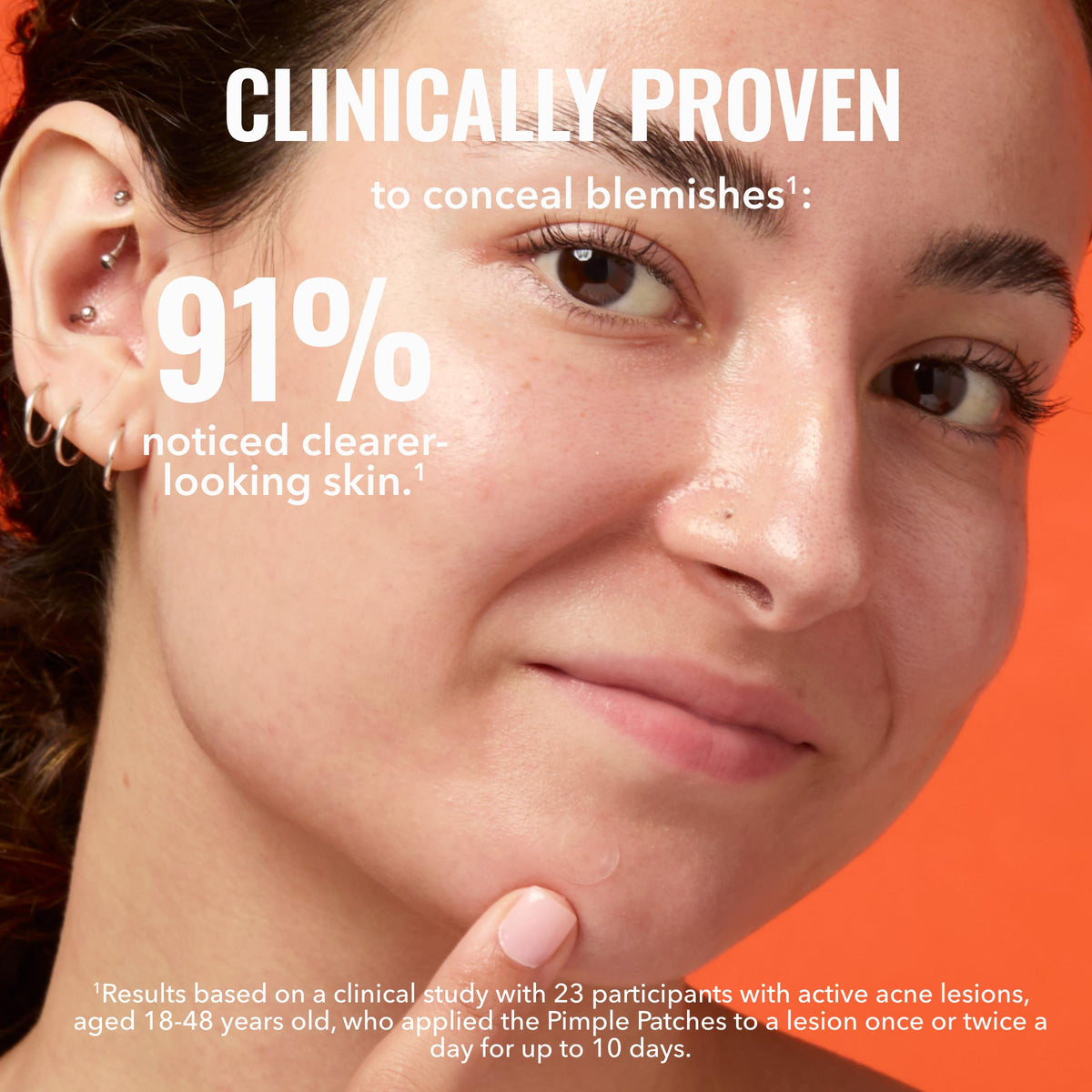 Good Molecules in-hand application placing a patch on a blemish for protection
