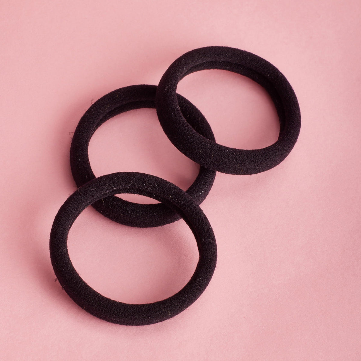 Goody hair tie worn in a high ponytail showing secure, no-slip hold