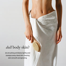 goop dry brush in use on leg demonstrating smooth skin and invigorating routine