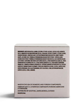 goop mini microderm placed in travel kit suggesting on-the-go glow