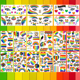 GOROMON face accent styling with small rainbow tattoos adding festival-ready color
