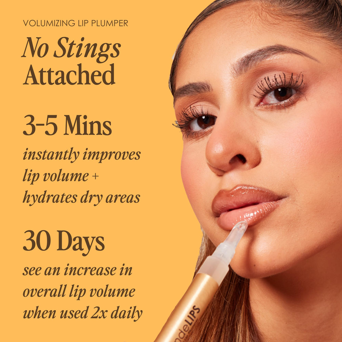 Grande Cosmetics gloss texture on lips showing glossy finish and hydrated look